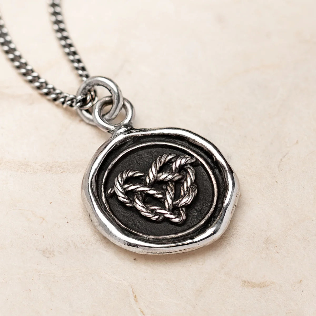 Pyrrha Talisman Necklace - Love Knot - Silver