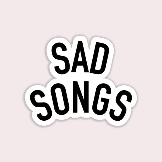 Sticker with 'SAD SONGS' text on a light pink background